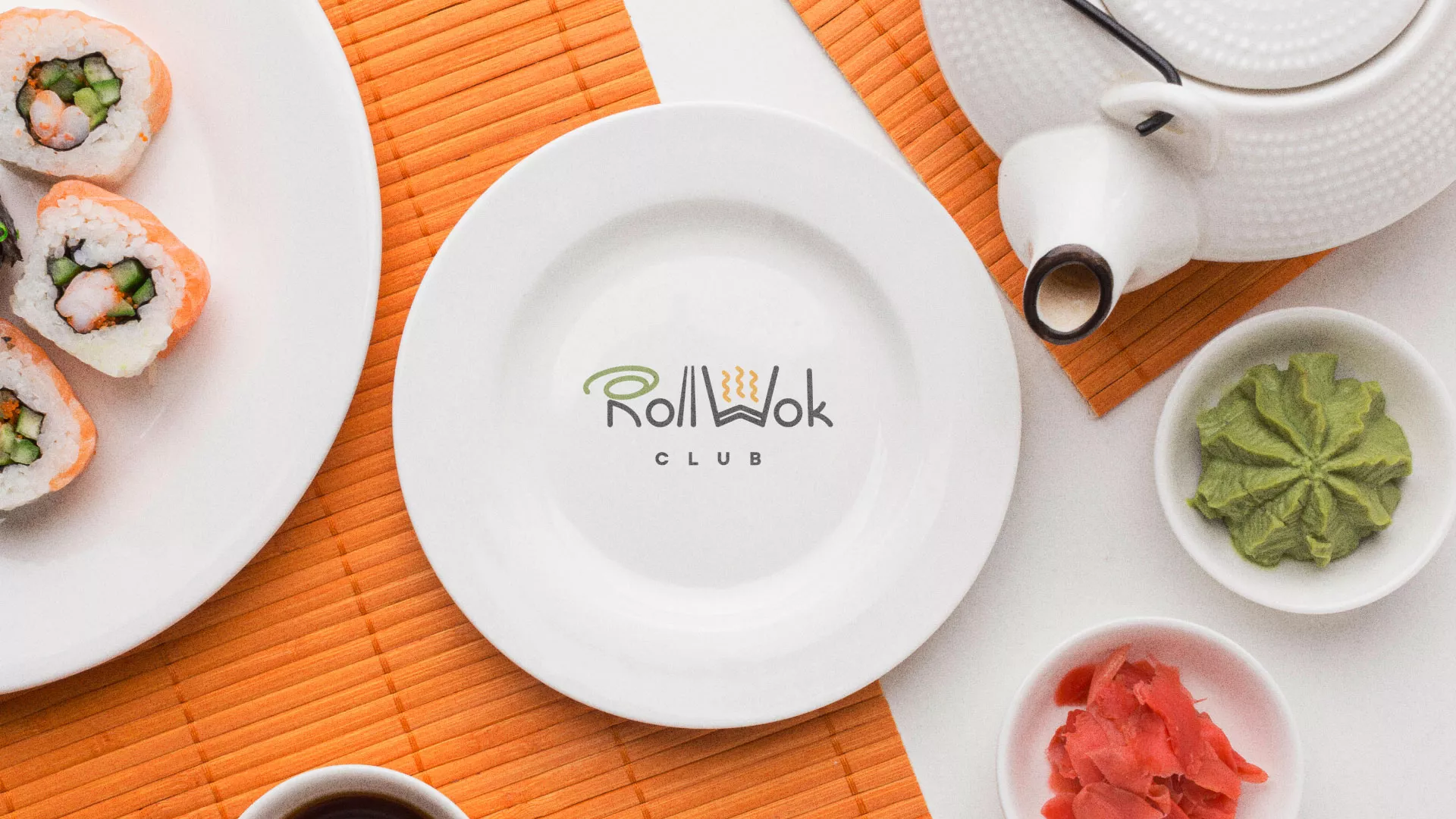 Разработка логотипа и фирменного стиля в Тутаеве для суши-бара «Roll Wok Club» Разработка логотипа и фирменного стиля в Тутаеве для суши-бара «Roll Wok Club»